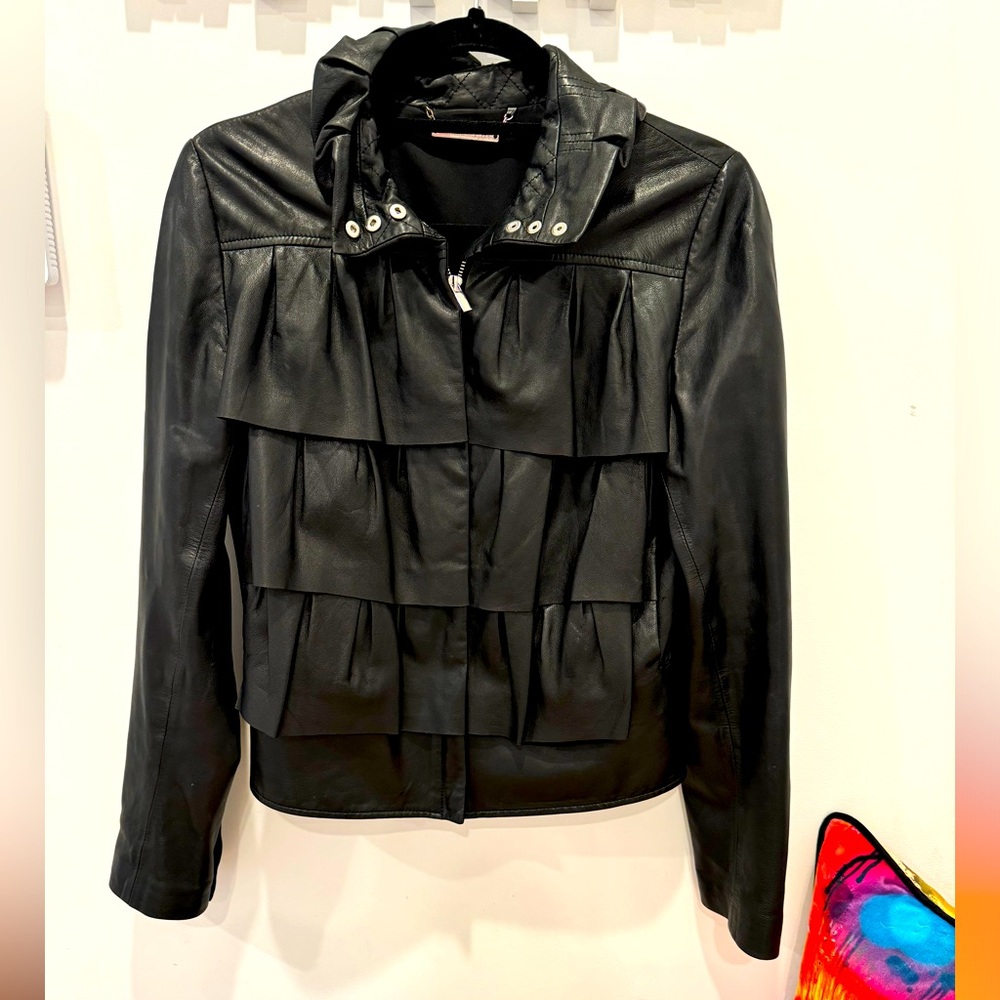 Diane Von Furstenberg 100% Genuine Black Leather Jacket with ruffles.  Size 6